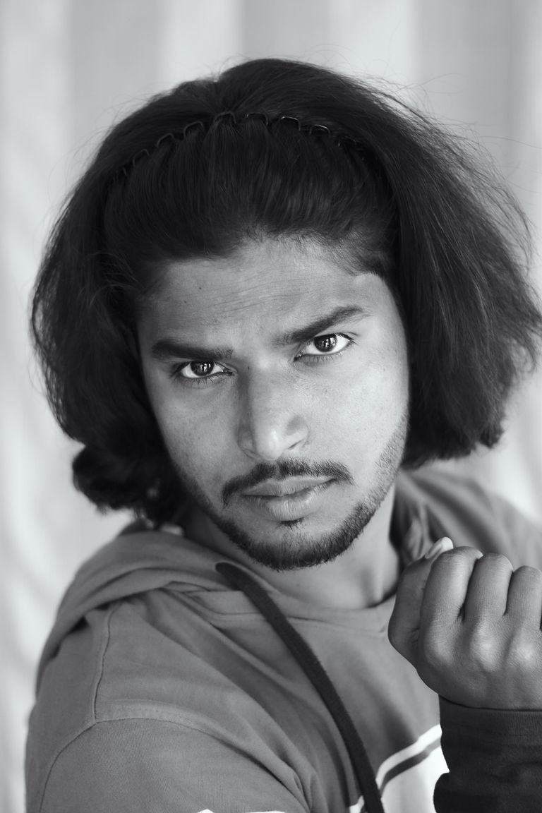 Man with a textured medium length hairstyle