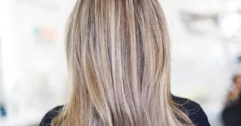 Brown hair with hand-painted balayage highlights viewed from behind