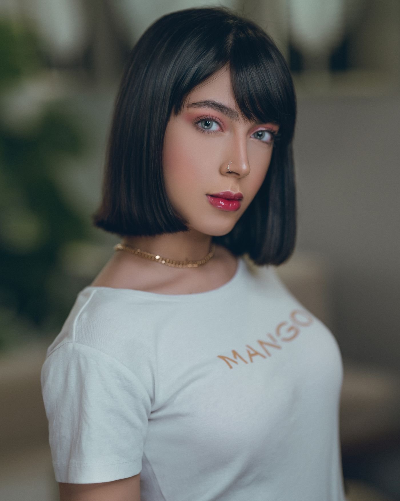Chic portrait of a young woman with a bob haircut