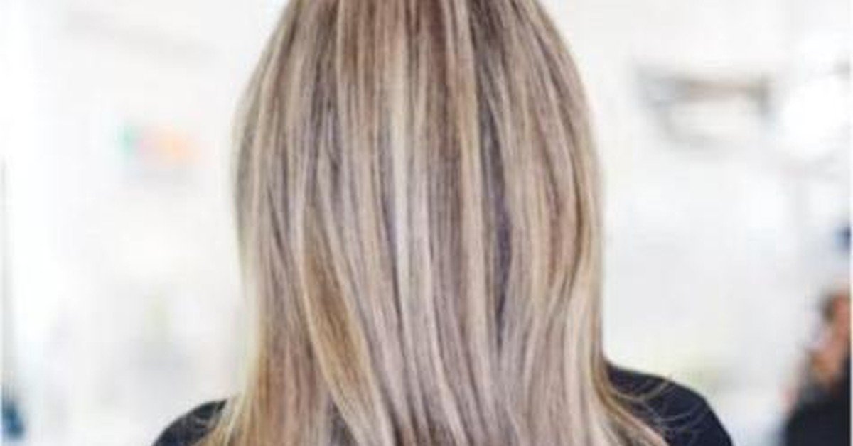 Long hair with a dark-to-light ombre hair color gradient
