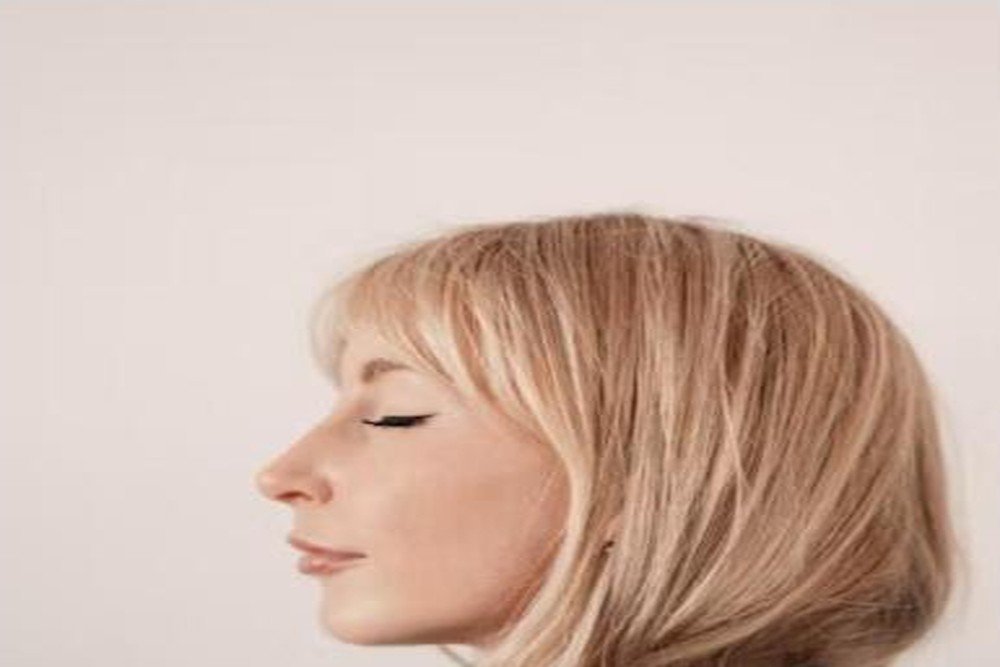 Side profile of a woman with a chin-length A-line bob haircut